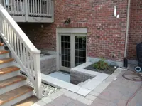 Picture of a basement residential unit with a walkout.